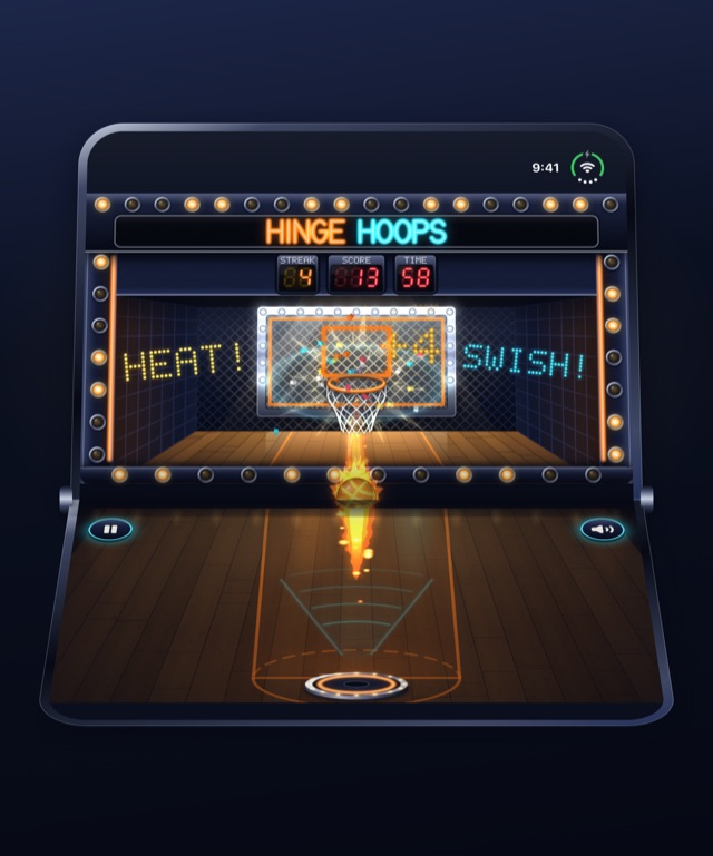 A phone folded like a laptop, the arcade cabinet on the raised half and the court on the half below. A ball on fire flies up from the pad, over the fold, toward the hoop, with HEAT and SWISH lit either side of the backboard.