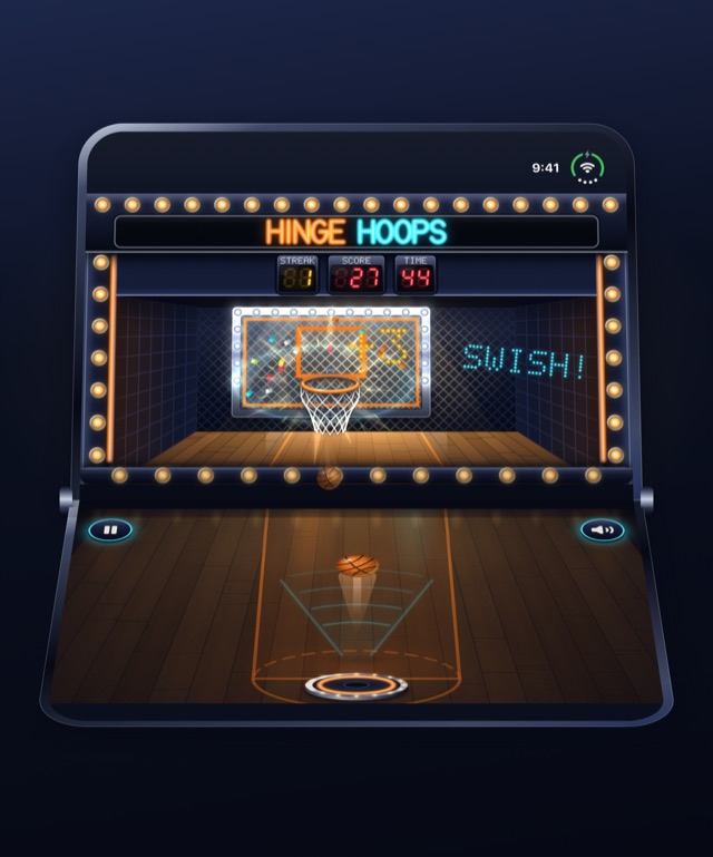 A clean swish: the ball dropping out of the net, SWISH lit beside the backboard, and the next ball on its way up from the pad.